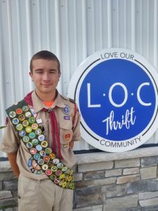 Ian Palinkas, a Lake Middle High School student and member of Boy Scout Troop 330 of Green Valley United Methodist Church, installed printed vinyl flooring as a sensory walk at the Love Our Community's thrift store and warehouse, 1236 Sunnyside St. SW.