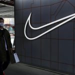 Nike falls amid eroding profitability and inventory buildup